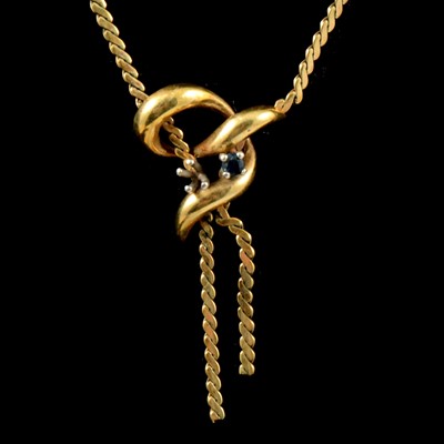 Lot 193 - A 9 carat yellow gold necklace with two sapphires.
