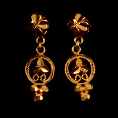 Lot 144 - A pair of yellow metal earrings.