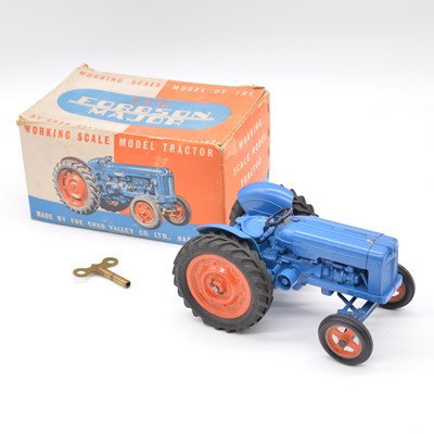 Lot 303 - Chad Valley Fordson Major tractor model, blue body, boxed.