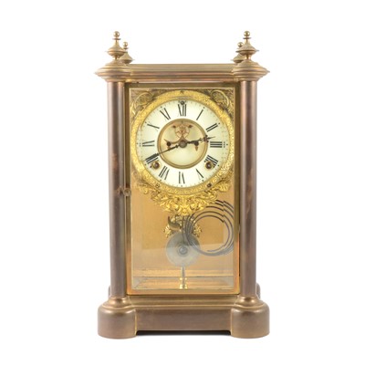 Lot 138 - American brass-cased four-glass table clock, Ansonia Clock Co, New York