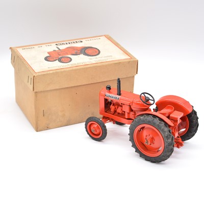 Lot 346 - Denzil Skinner & Co model Nuffield Universal tractor, red body, boxed with instructions.