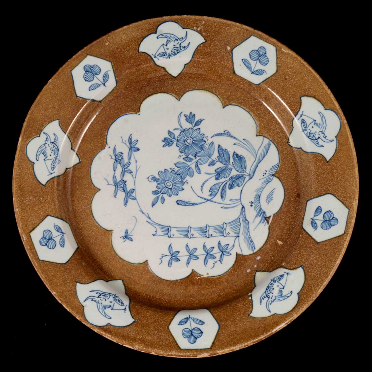 Lot 78 - A large English delft plate, probably Lambeth, mid 18th century