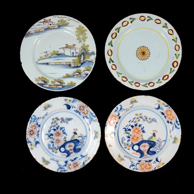 Lot 60 - An English delft polychrome plate, mid-18th century, and three others