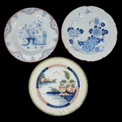 Lot 59 - An English delft basin, 18th century, and two English delft plates