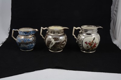 Lot 57 - A collection of seven silver lustre jugs