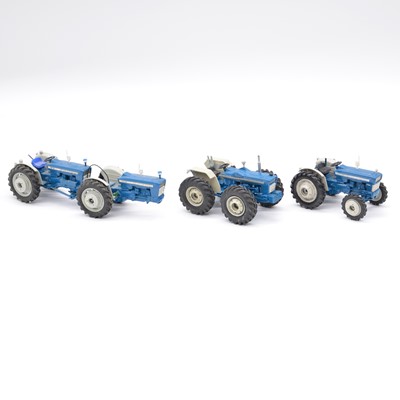 Lot 359 - Three man built/modified die-cast model tractors.