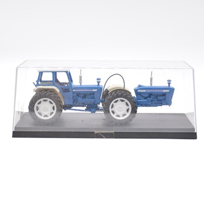 Lot 333 - Custom built/modified die-cast model tractor, Ford 5000, with Britains mud guards, cased.