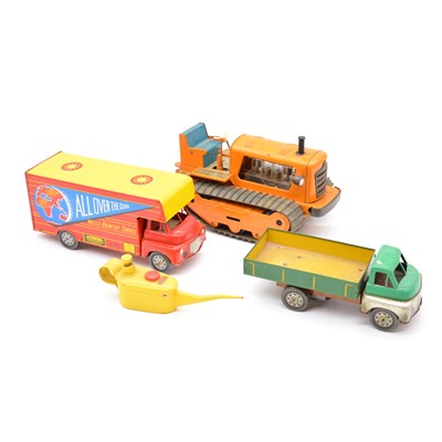 Lot 50 - Four tin-plate toy including Caterpillar type tractor and Wells Brimtoy van etc