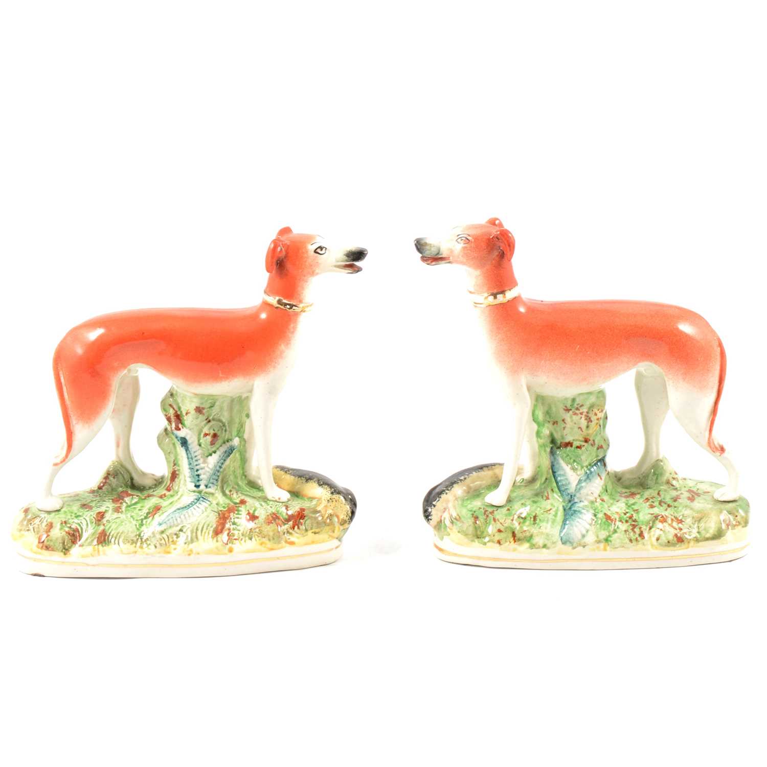 Lot 6 - Pair of Staffordshire pottery models, greyhounds