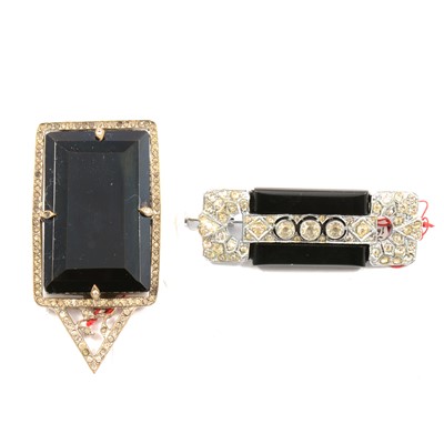 Lot 370 - Twenty-seven Art Deco simulated onyx and paste set brooches, dress clips and earrings.