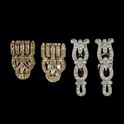 Lot 387 - Thirty-four vintage paste set double dress clips and a belt clasp.