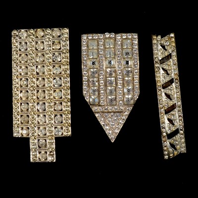 Lot 388 - Fifteen double and eighteen single 1930s and later Czechoslovakian paste set dress clips.