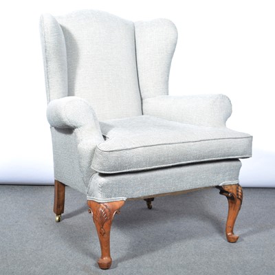 Lot 504 - Wing-back easy chair