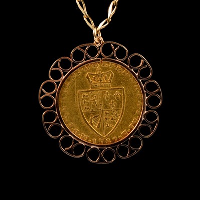 Lot 114 - A Gold Spade Guinea pendant and chain.