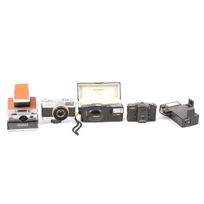 Lot 97 - Four vintage cameras, including Polaroid SX-70 land camera