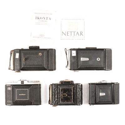 Lot 95 - Five Zeiss Ikon vintage cameras, all with folding bellows, various models.
