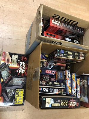 Lot 437 - Star Wars games and puzzles, two boxes full including two Star Wars Monopoly editions etc