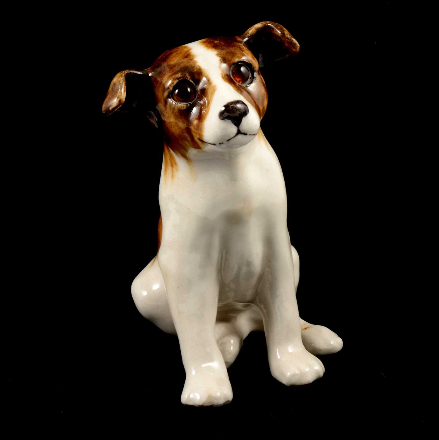 Lot 19 - Winstanley pottery model of a seated puppy