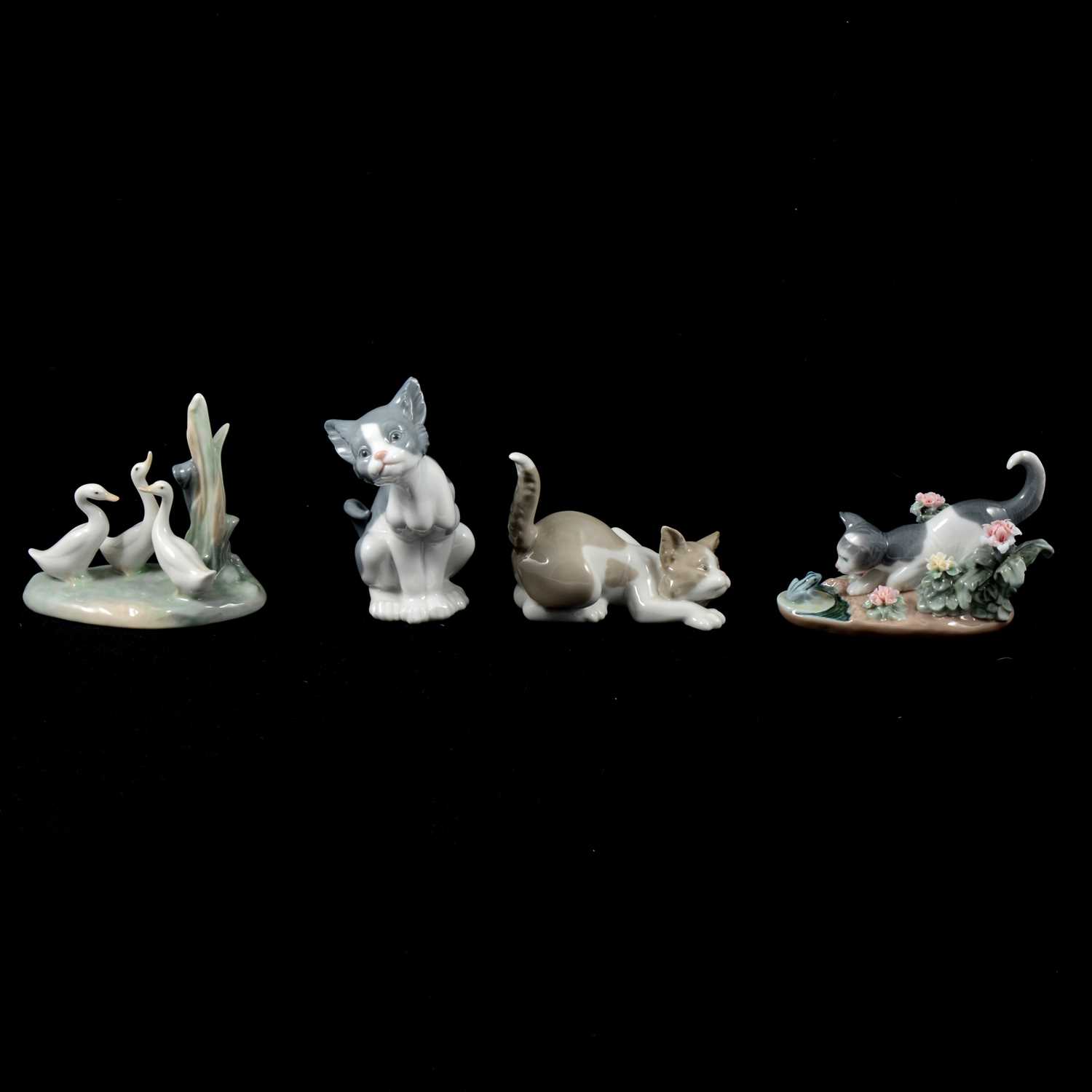 Lot 8 - Nine Lladro and Nao ceramic animal figures.