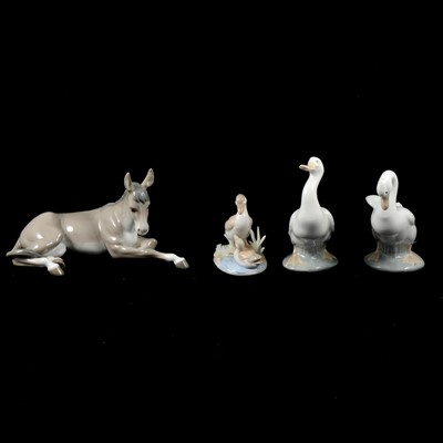 Lot 8 - Nine Lladro and Nao ceramic animal figures.