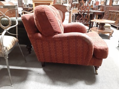 Lot 454 - Traditional fireside chair