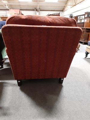 Lot 454 - Traditional fireside chair