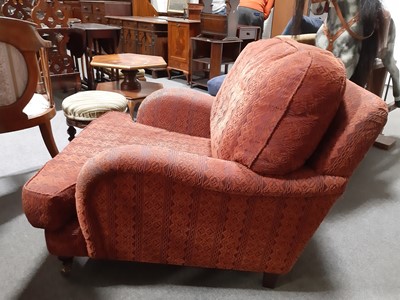 Lot 454 - Traditional fireside chair