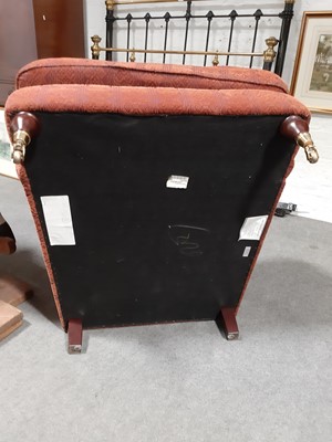 Lot 454 - Traditional fireside chair