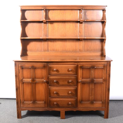 Lot 404 - Ercol elm dresser