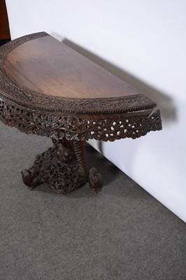 Lot 245 - Burmese carved hardwood console table