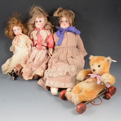 Lot 6 - Three early 20th-century bisque head dolls and a Stieff
