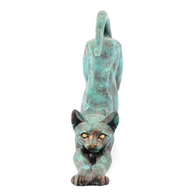Lot 32 - Four cats figurines and two hare figurines.