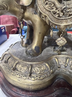 Lot 145 - Chinese cast gilt metal centrepiece with elephants