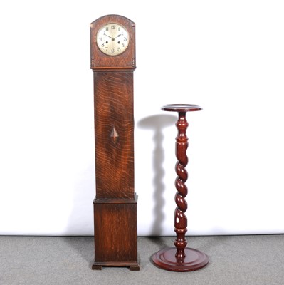 Lot 402 - Oak Granddaughter clock, and a stained wood torchere