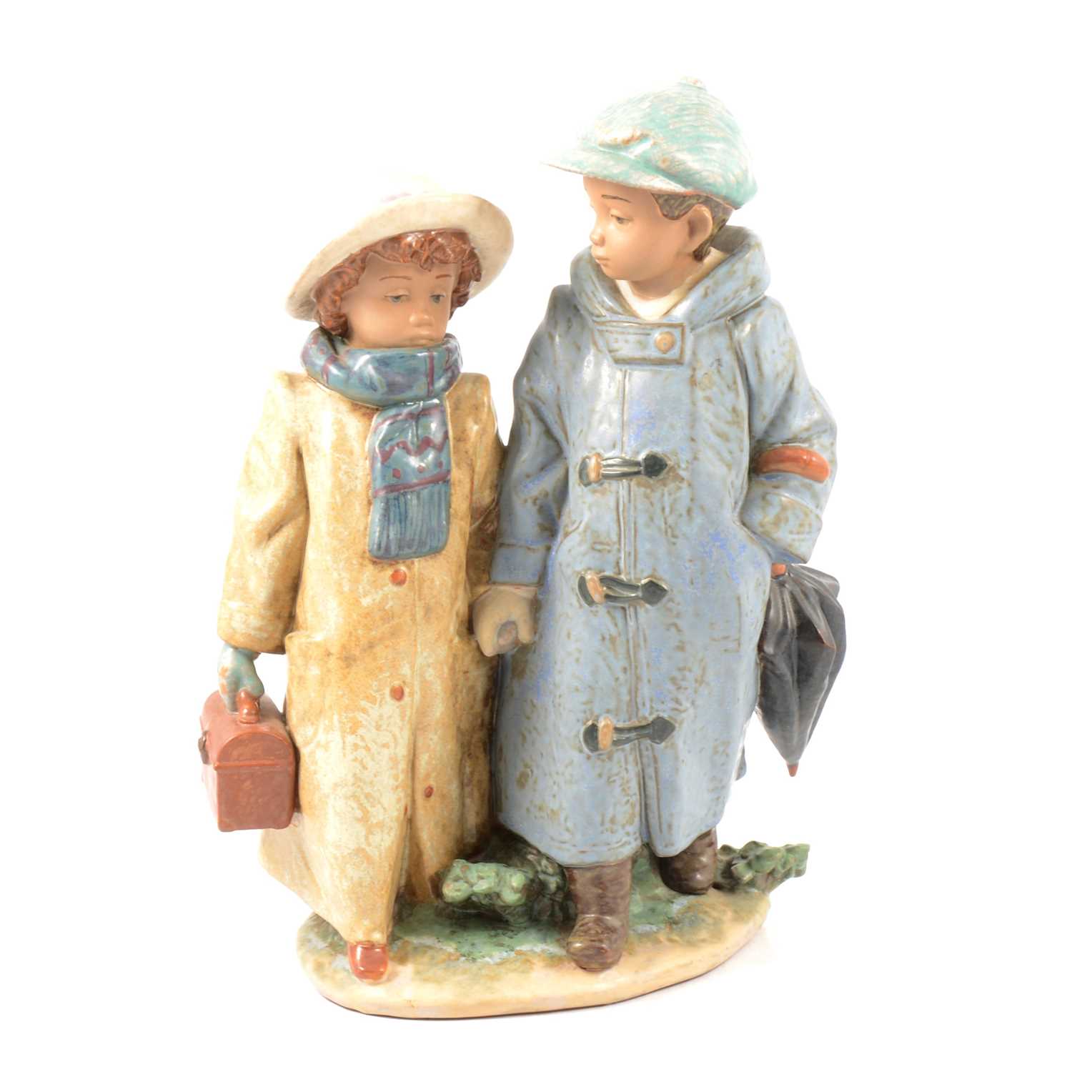 Lot 11 - Lladro "Away to School" figural group.