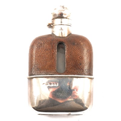 Lot 409 - A small silver and glass hip flask, London 1928.