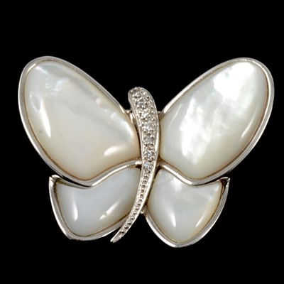 Lot 152 - A mother of pearl butterfly brooch set with diamonds.