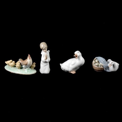 Lot 37 - Four Lladro figurines and five Nao figurines.
