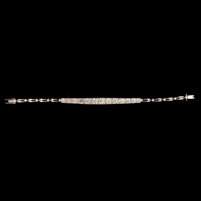 Lot 189 - A thirteen stone diamond bracelet.