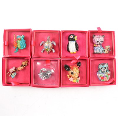 Lot 335 - Butler & Wilson - eight novelty crystal brooches, pink boxed Circa 2011-2014.