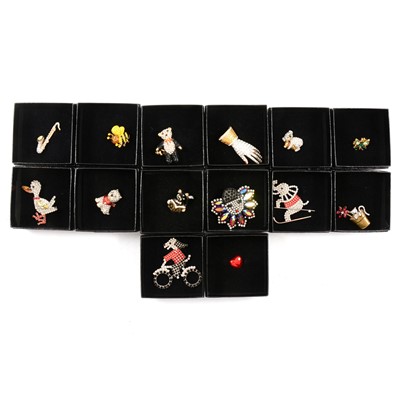 Lot 340 - Butler & Wilson - fourteen  novelty crystal brooches, black boxed Circa 1990’s.