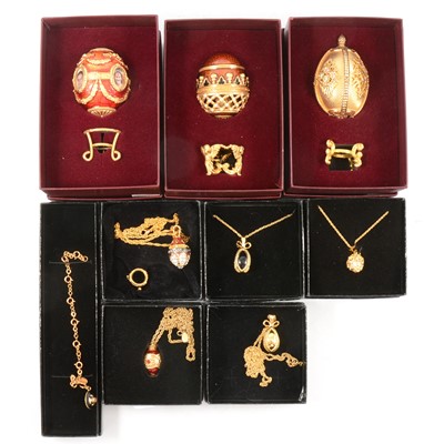 Lot 354 - Joan Rivers - three Imperial Treasures Faberge style eggs and three pendants.