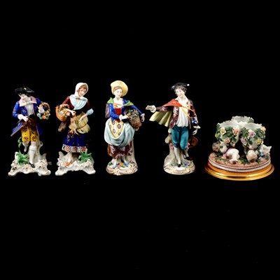 Lot 80 - Four Continental porcelain figures, and a Dresden style posy holder