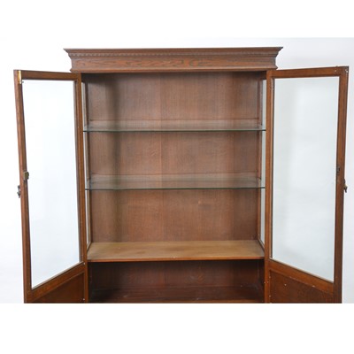Lot 55 - Glazed oak bookcase on stand