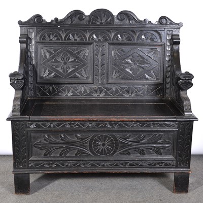 Lot 515 - Carved oak settle