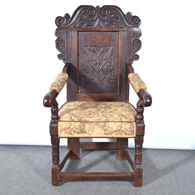 Lot 575 - Joined oak elbow chair, bears date 1692,...