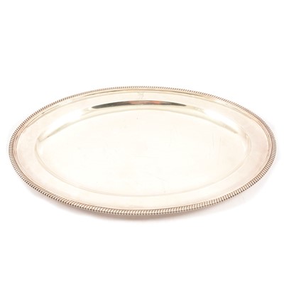 Lot 219 - A George III oval silver meat plate, Andrew Fogelberg & Stephen Gilbert