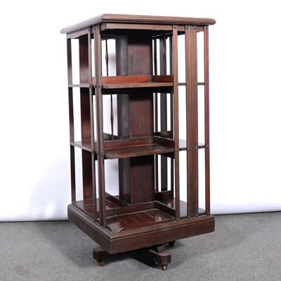 Lot 465 - Edwardian walnut revolving bookcase