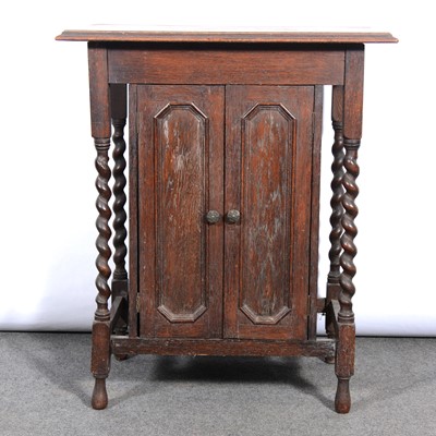 Lot 432 - Small oak music cabinet