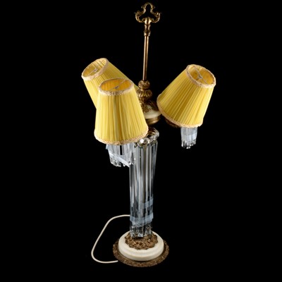 Lot 15 - Gilt metal and marble three-light lamp with prism drops